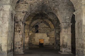 Fototapeta na wymiar Old abandoned basement in the castle.