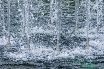 Naklejka na ściany i meble Close up of fountain, Splashes of water.