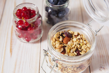 healthy breakfast homemade baked granola or muesli with fresh blueberries white background