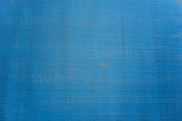 Vintage abstract plaster wall blue background with dark stripes.