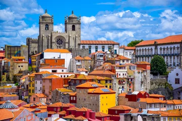 Fotobehang View over the old town of Porto, Portugal with the cathedral and colorful buildings © Zoegraphy