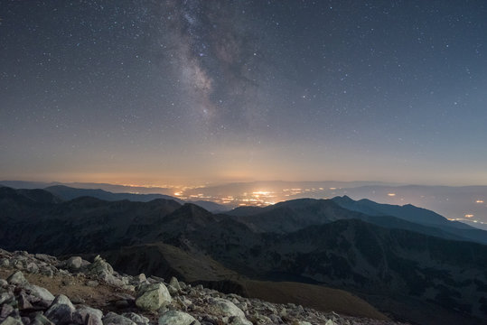 The Milky Way at night from a mountain top - typical image of solitude, relaxation and reaching high peaks
