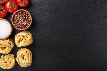 raw tagliatelle pasta with spices