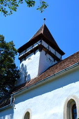 Fortified medieval saxon church in Cincsor-Kleinschenk, Sibiu county, Transylvania, Romania.. 
The church with a tower on the west is built in 1427