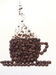 is made from coffee beans and coffee cup on white background.drinks