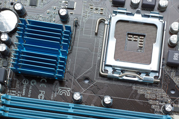 close view at empty processor socket on computer motherboard