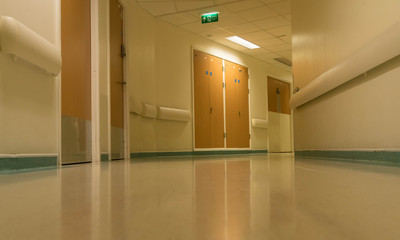 Curved hospital corridor at night