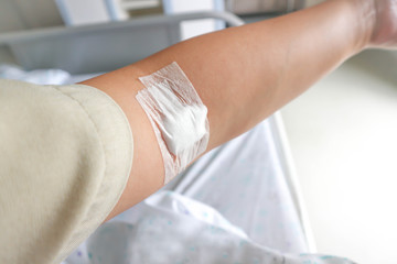 adhesive plaster on arm