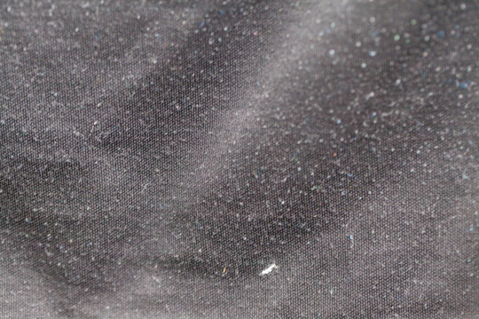 dust on black shirt