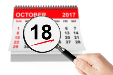Alaska Day Concept. 18 october 2017 calendar with magnifier