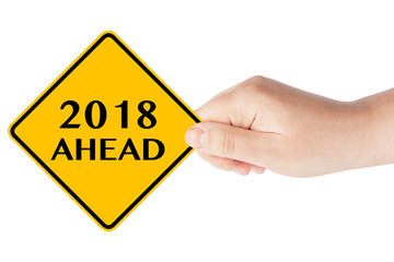 2018 Year Ahead Traffic Sign in Woman's Hand
