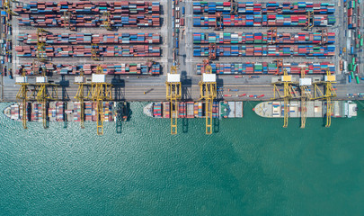 Fototapeta na wymiar container,container ship in import export and business logistic,By crane,Trade Port , Shipping,cargo to harbor.Aerial view,Water transport,International,Shell Marine,transportation,logistic,trade,port