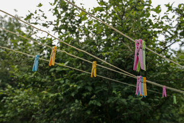 colorful clothespins on the rope