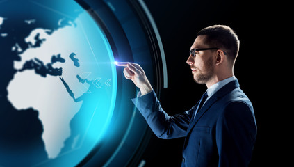 businessman with earth hologram over black