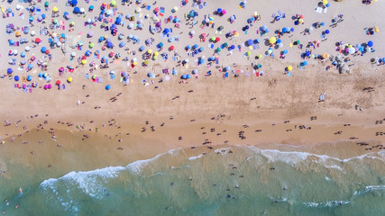 Aerial. Conceptual photo of the beach and tourists. From sky.