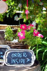 Welcome sign at a hipster cafe