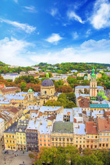 Fototapeta premium Beautiful view of the Dominican Cathedral, the Assumption Church and the historic center of Lviv, Ukraine, on a sunny day