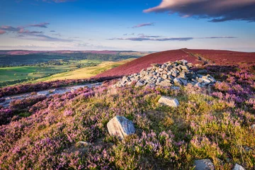 Wall murals Hill Cairn on Simonside Hills Ridge, popular with walkers and hikers they are covered with heather in summer, and are part of Northumberland National Park, overlooking the  Cheviot Hills