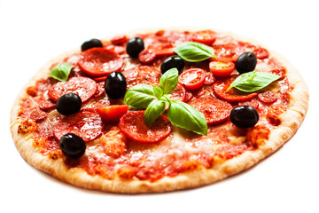 Pepperoni pizza with fresh ingredients isolated on white background, top view. Banner or wallpaper .