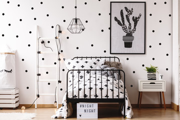 Monochromatic kids room with plant