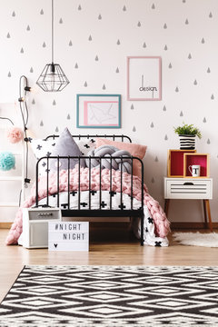 Pastel kids room with bed