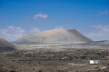 Fototapeta na wymiar Volcano with blue sky