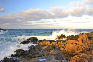 Waves crashing on the rugged coastline. Lanzarote, Canary Islands, Spain