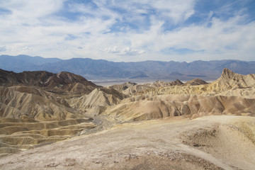 Fototapeta na wymiar Beautiful petrified sand dunes of Zabriskie Point, Death Valley national park, California, USA.