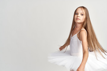 Little girl ballerina, blank space for copy