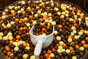 Tasty chocolate balls in candy store