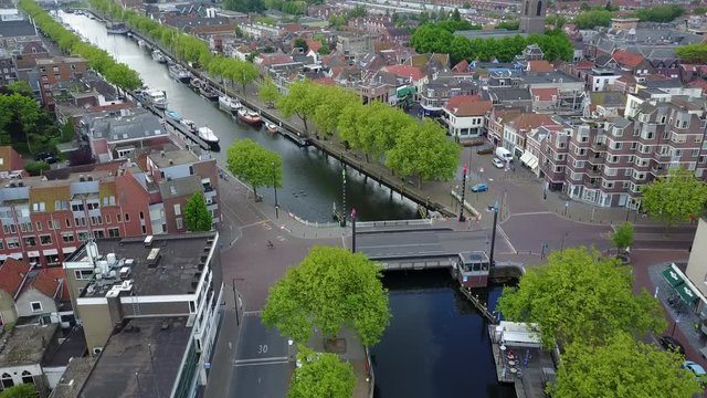 test2\Drone footage of Dutch city, harbor with boats and sailing ships, typical architecture in Holland, Europe.