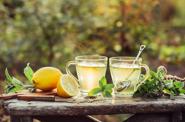 Two cups of hot tea.