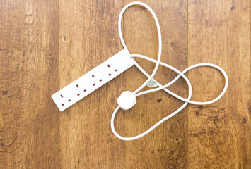 White UK power extension lead with multiple sockets