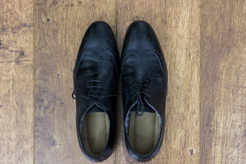 A pair of smart balck mens shoes