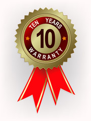 emblem of gold color with red ribbons, ten-year guarantee
