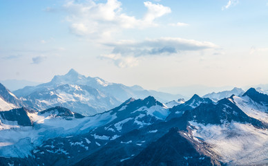 Obraz premium Snow covered Elbrus mountains at winter sunny day