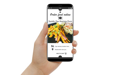 Isolated female hand holding smartphone and ordering vegetarian food online