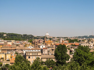 Fototapeta na wymiar A view of Rome from Giardino degli Aranci's viewpoint in Rome - St Peter's Basilica in the background