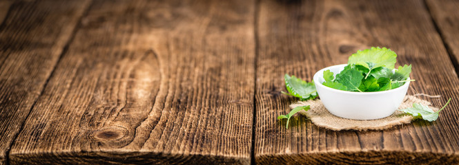 Balm on vintage wooden background