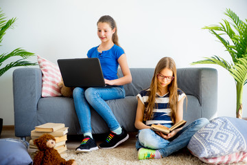 Two girl studying at home