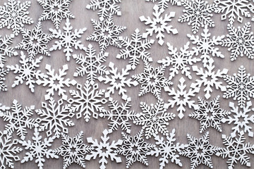 Christmas, New Year wooden decoration snowflake.