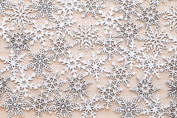 Christmas, New Year wooden decoration snowflake.