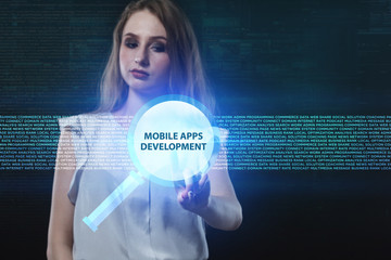 The concept of business, technology, the Internet and the network. A young entrepreneur working on a virtual screen of the future and sees the inscription: Mobile apps development