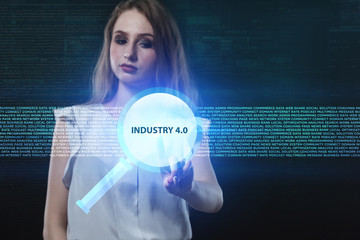 The concept of business, technology, the Internet and the network. A young entrepreneur working on a virtual screen of the future and sees the inscription: Industry 4.0