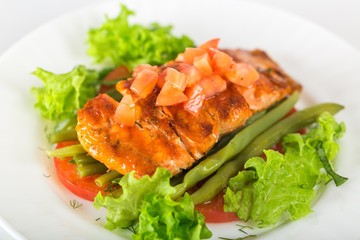 Fried fish with vegetables.