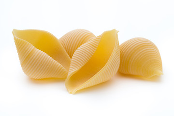 Italian lumaconi isolated on white background.