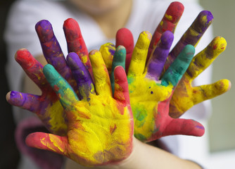 little girl and boy hands painted