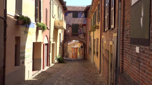 houses on narrow street of the medieval village of Dozza, a small gem among the architectural wonders of Italy
