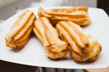 Eclairs or profiterole with whipped cream