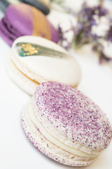colorful macaroon cakes  against white background